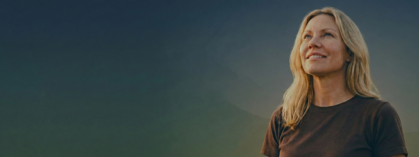 Woman looking up with hope